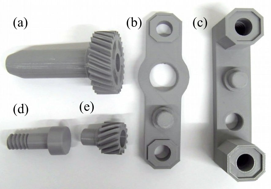 Parts to be collected: (a) Large gear (b) Gearbox top (c) Gearbox bottom (d) Screw (e) Small gear. Note that the large gear (a) is meant to be machined to have threads; the large gear must be inserted into a machine for this process to occur.